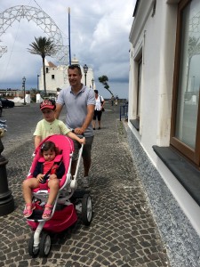 A family walks around Ischia, Italy on Sunday June 12, 2016. Ischia is home to 60,000 people and is most commonly known for their volcanic hot springs. (Photography by Kylie Warren)