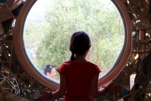 A girl looks out a window at the Tarot Gardens in Capalbio, Italy on Wednesday, June 15, 2016. Niki de Saint Phalle was inspired by Antoni Gaudi’s Parc Guell in Barcelona, Spain.
